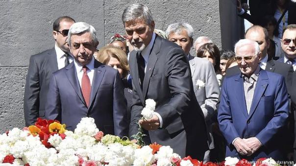 George Clooney and president Serzh Sargsyan lay flowers at Armenian genocide memorial